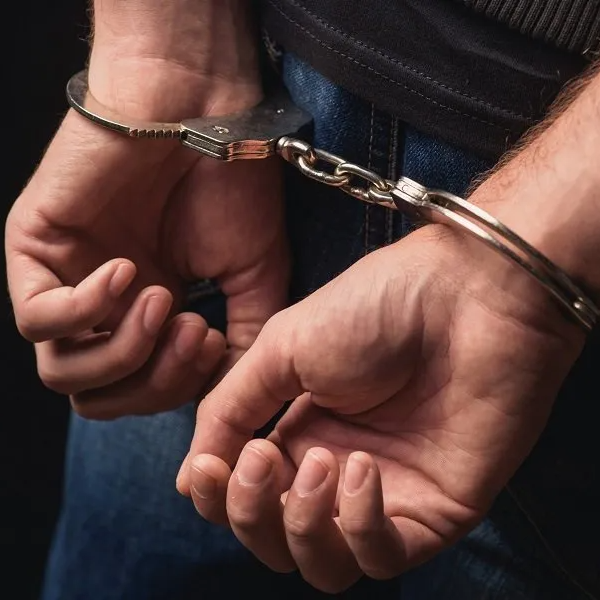Hands in Cuffs - The Fuller Law Firm in Casper, WI