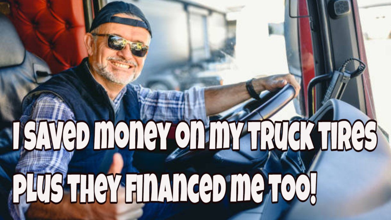a truck driver is giving a thumbs up while sitting in the driver 's seat of his truck .