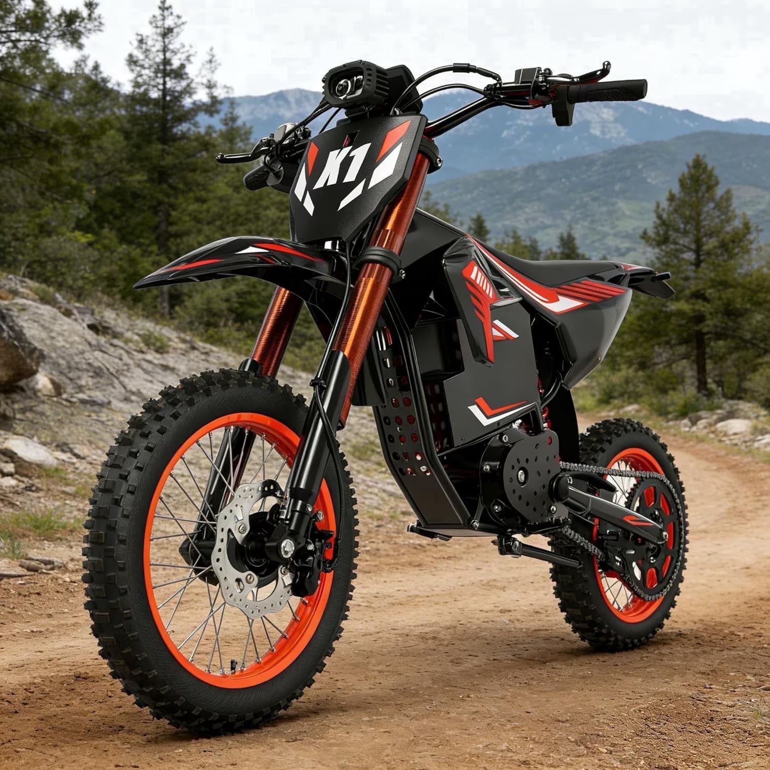 Black and orange electric dirt bike with knobby tires parked on asphalt against a concrete wall.