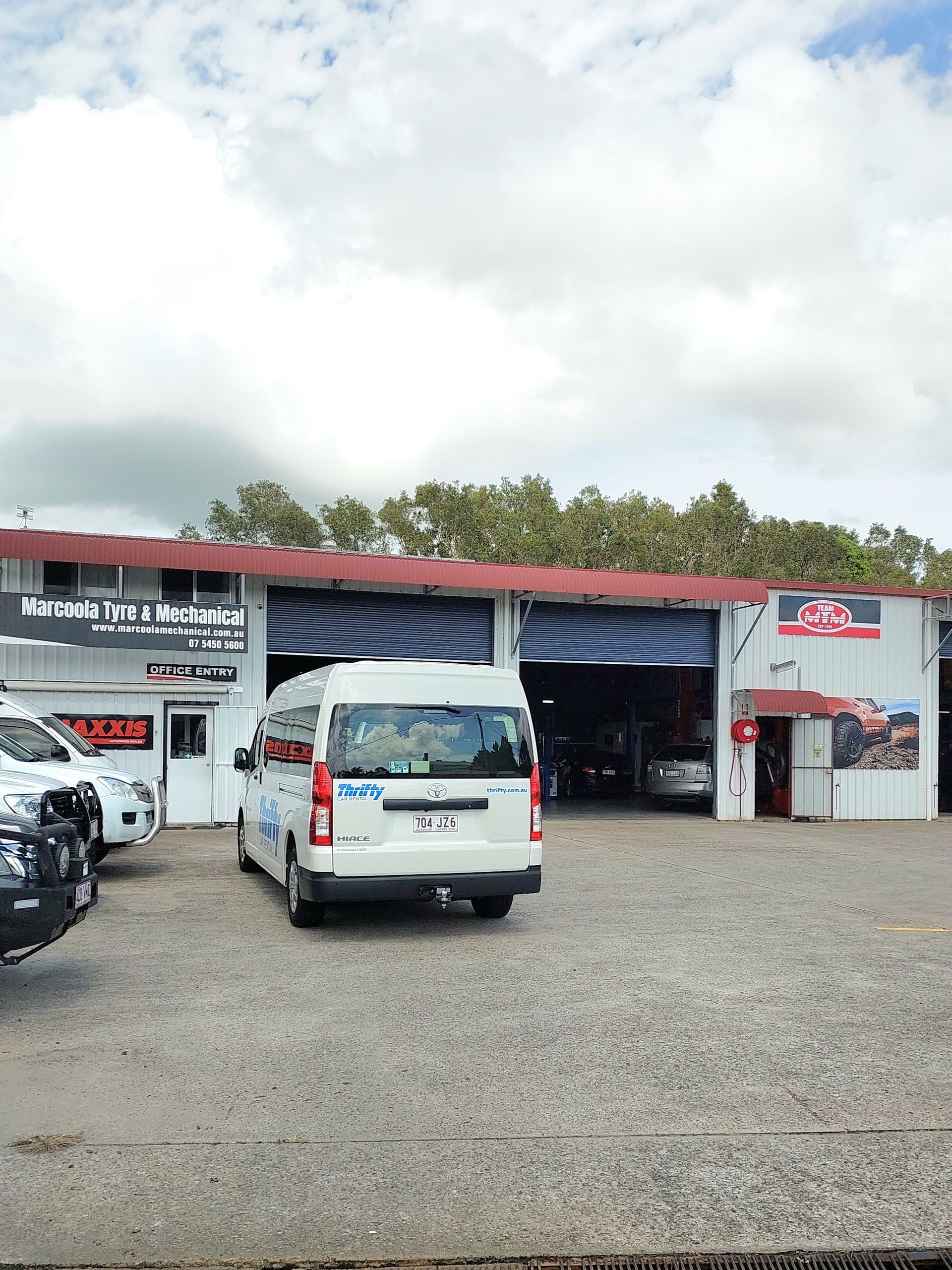 A Bunch Of Screws And Nuts Are Sitting On A Table — Marcoola Tyre & Mechanical In Marcoola, QLD