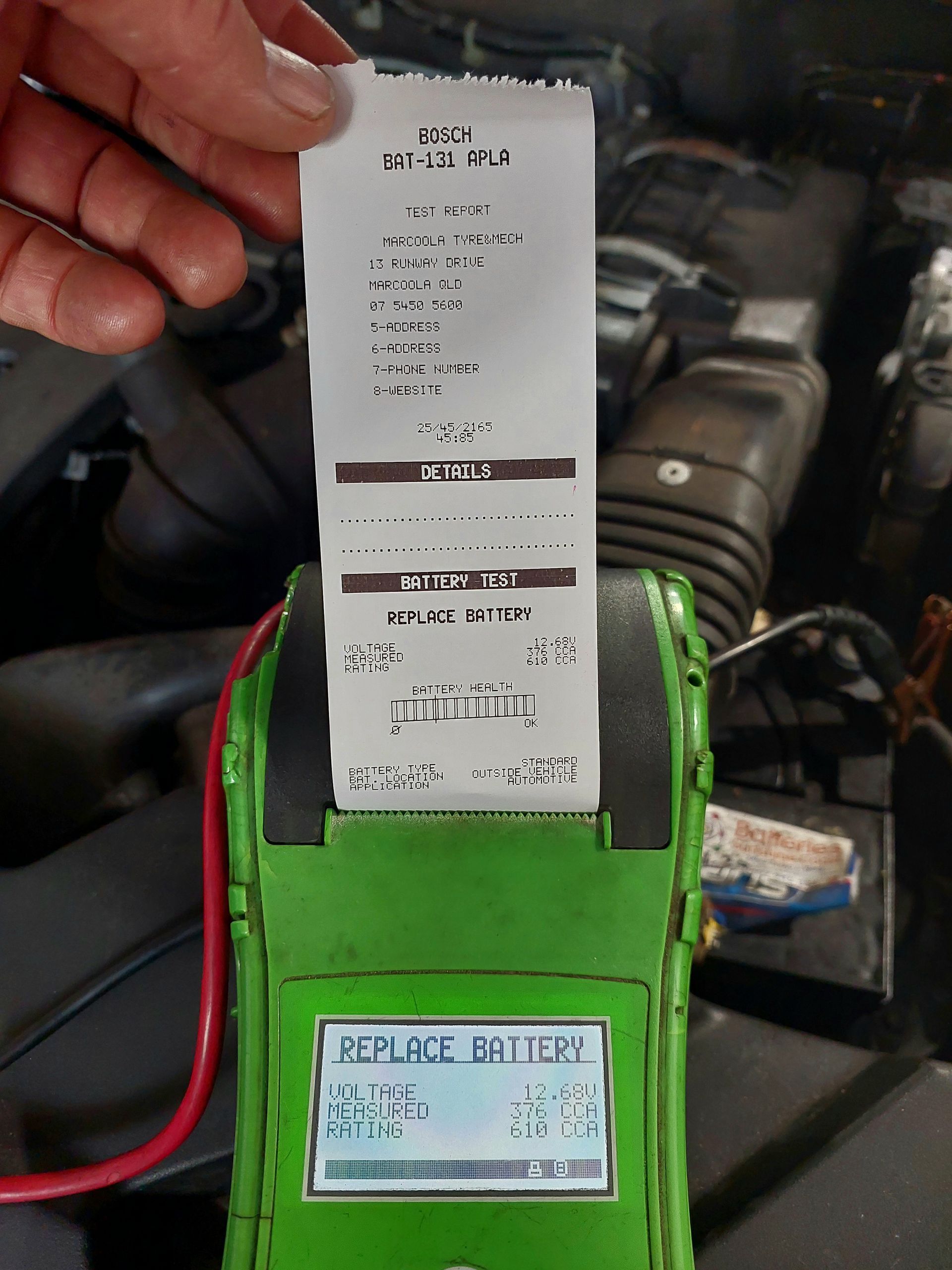 A Battery Test Machine Is Checking A Battery — Marcoola Tyre & Mechanical In Marcoola, QLD