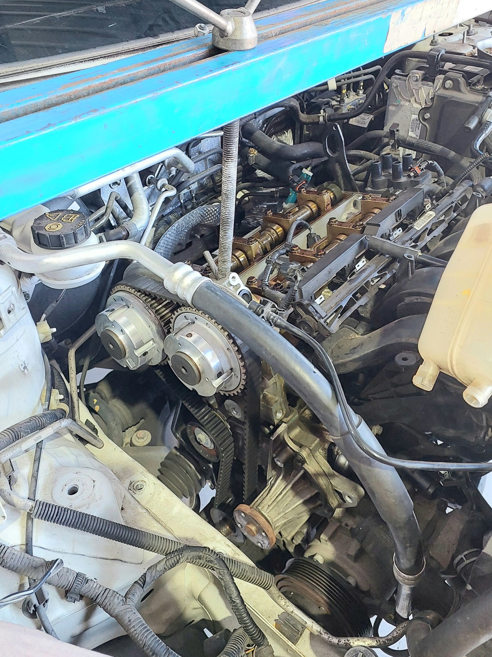 An Engine Is Being Worked On — Marcoola Tyre & Mechanical In Marcoola, QLD
