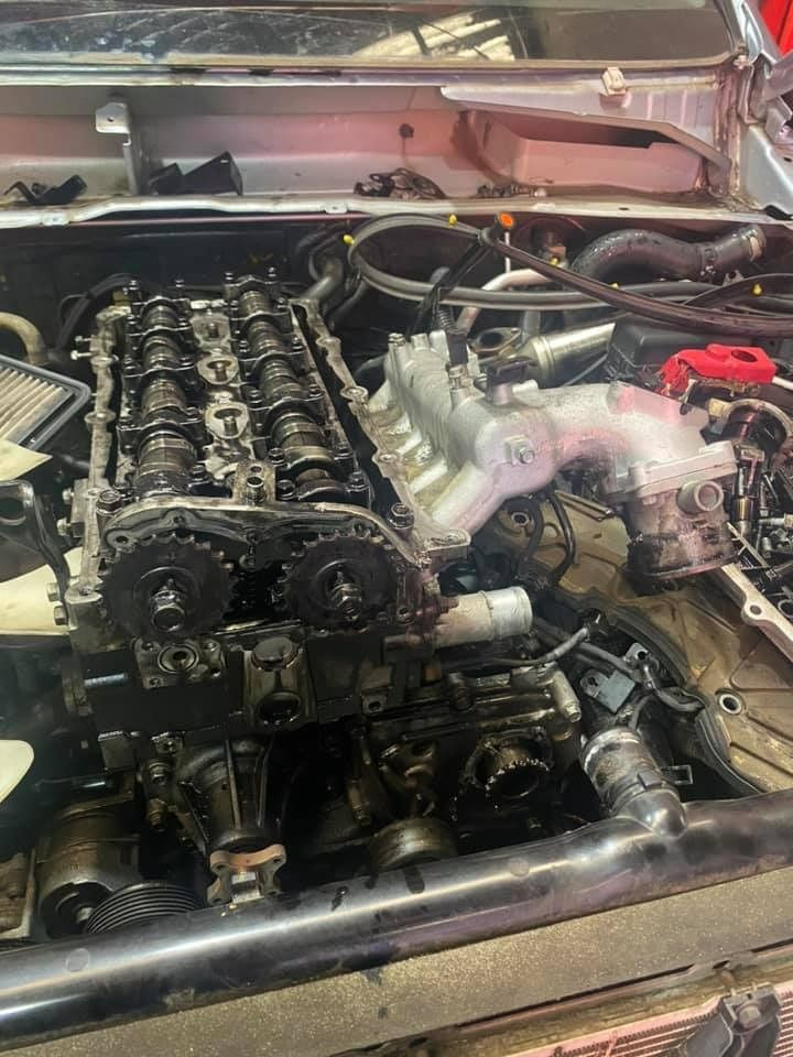 A Car Engine Is Being Worked On In A Garage — Marcoola Tyre & Mechanical In Sunshine Coast, QLD