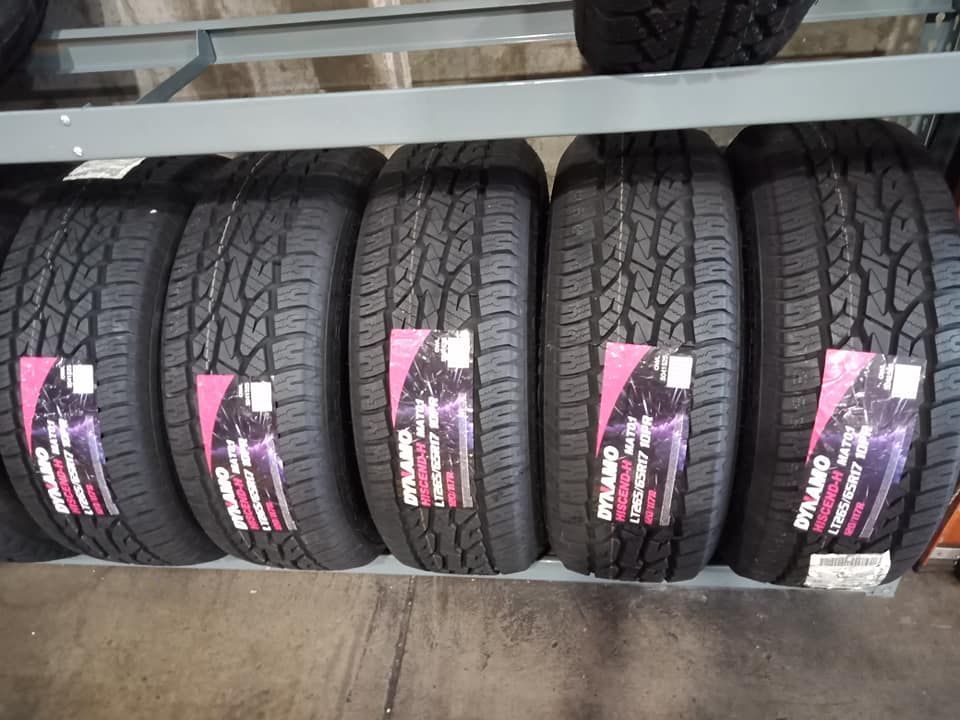 A Bunch Of Tires Are Lined Up On A Shelf — Marcoola Tyre & Mechanical In Coolum, QLD
