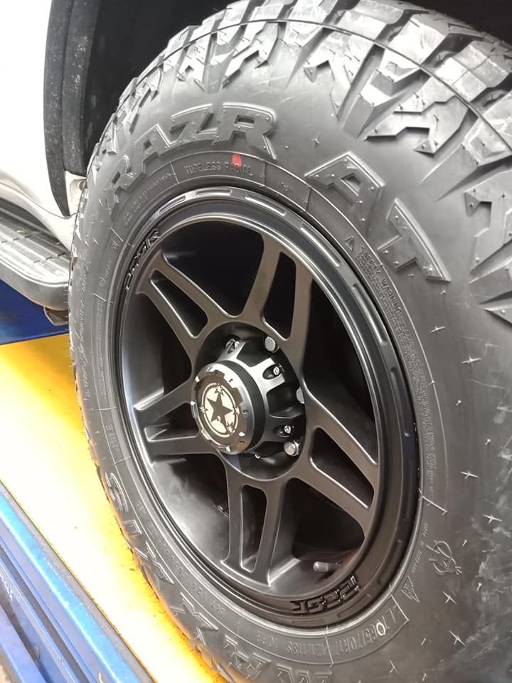 A Close Up Of A Tire And Wheel On A Vehicle — Marcoola Tyre & Mechanical In Mudjimba, QLD