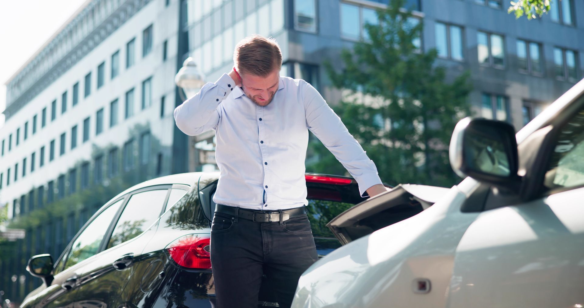 Car accident injury lawyer case involving damaged vehicles after collision.