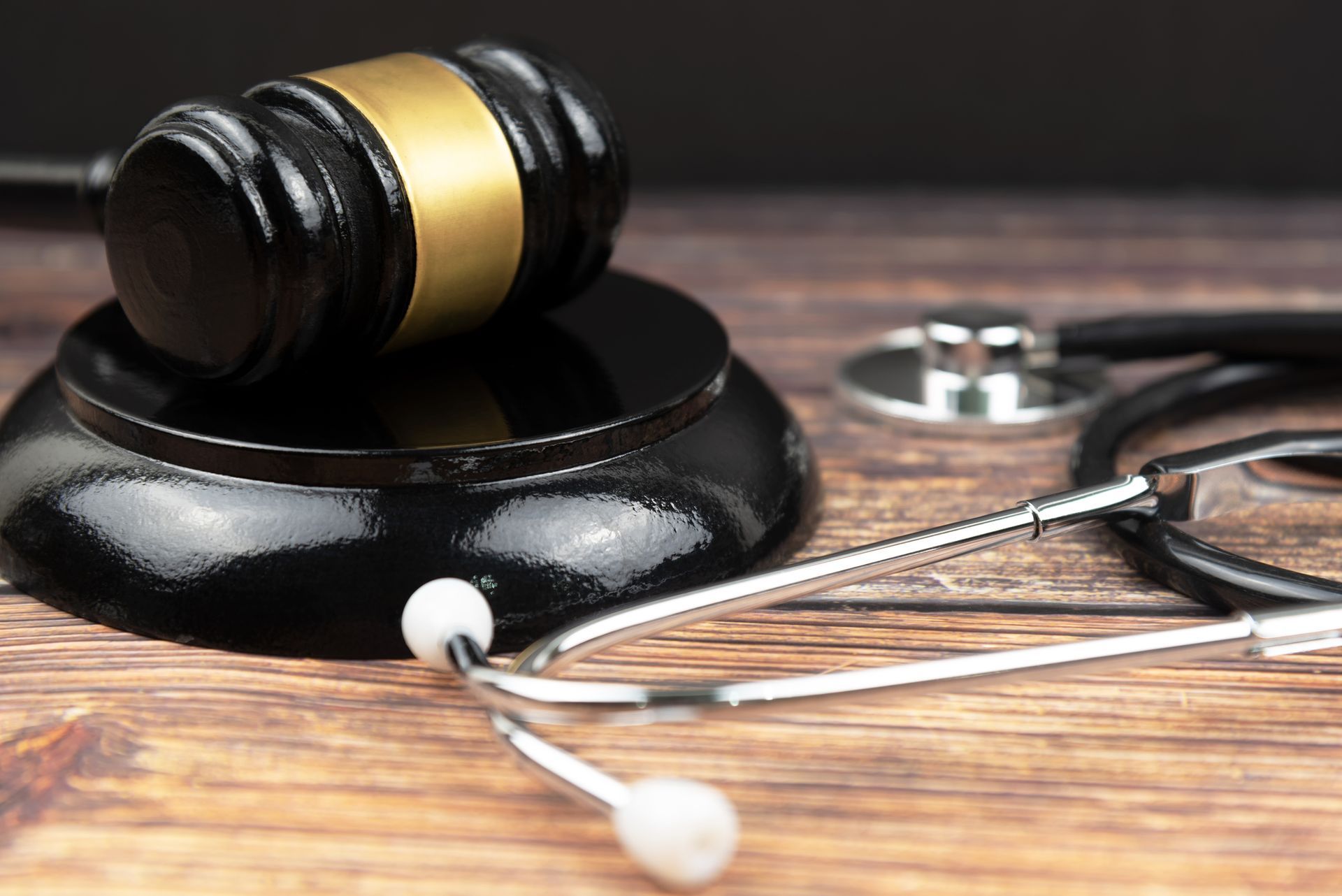 Gavel and stethoscope medical jurisprudence. legal definition