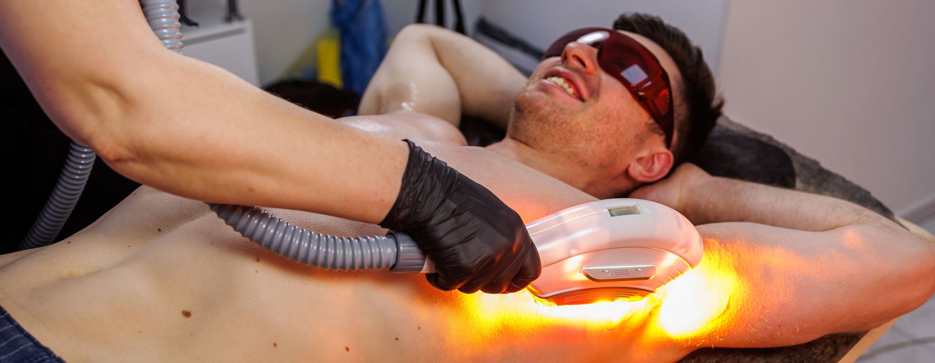 A Person Receiving Underarm Laser Hair Removal Treatment — Hope Laser and Beauty Clinic in Forster, NSW