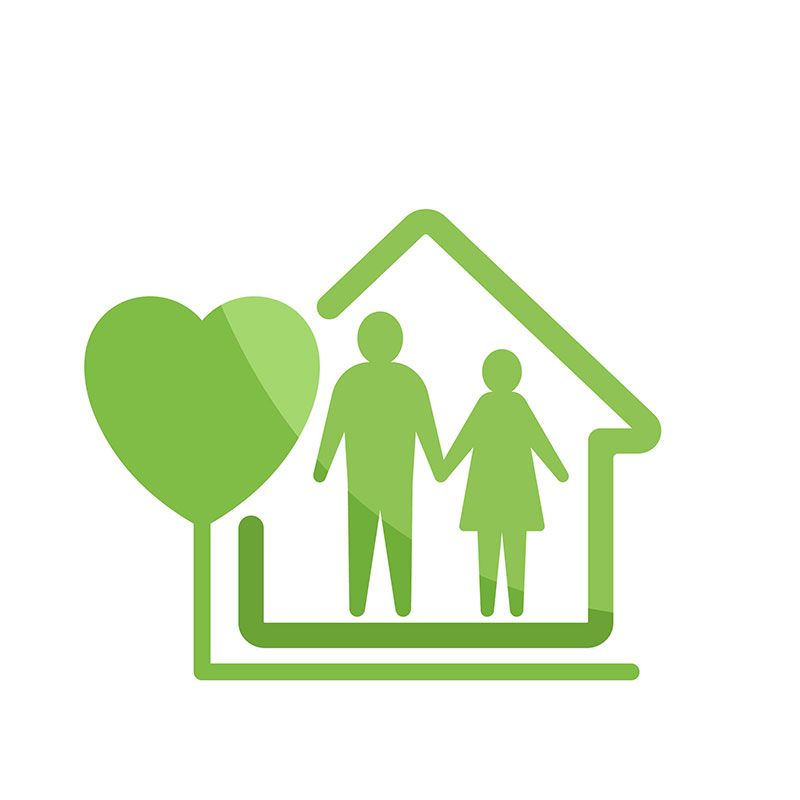 A man and a woman are standing inside of a house holding hands.