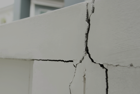 Cracked concrete, render on a wall