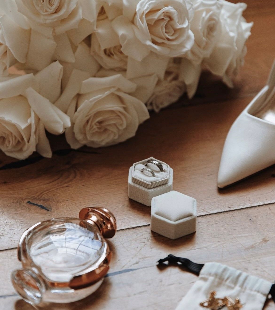 a bride and groom are walking down the aisle at their wedding .