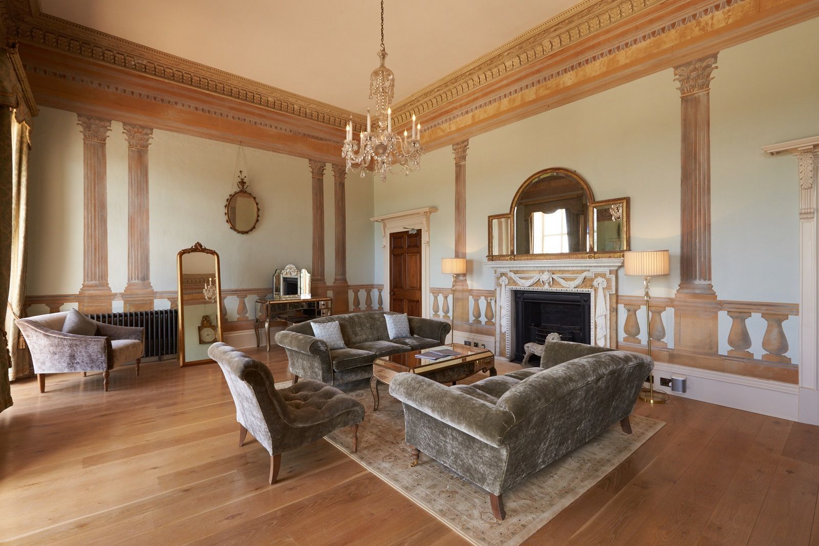 a living room filled with furniture and a fireplace .