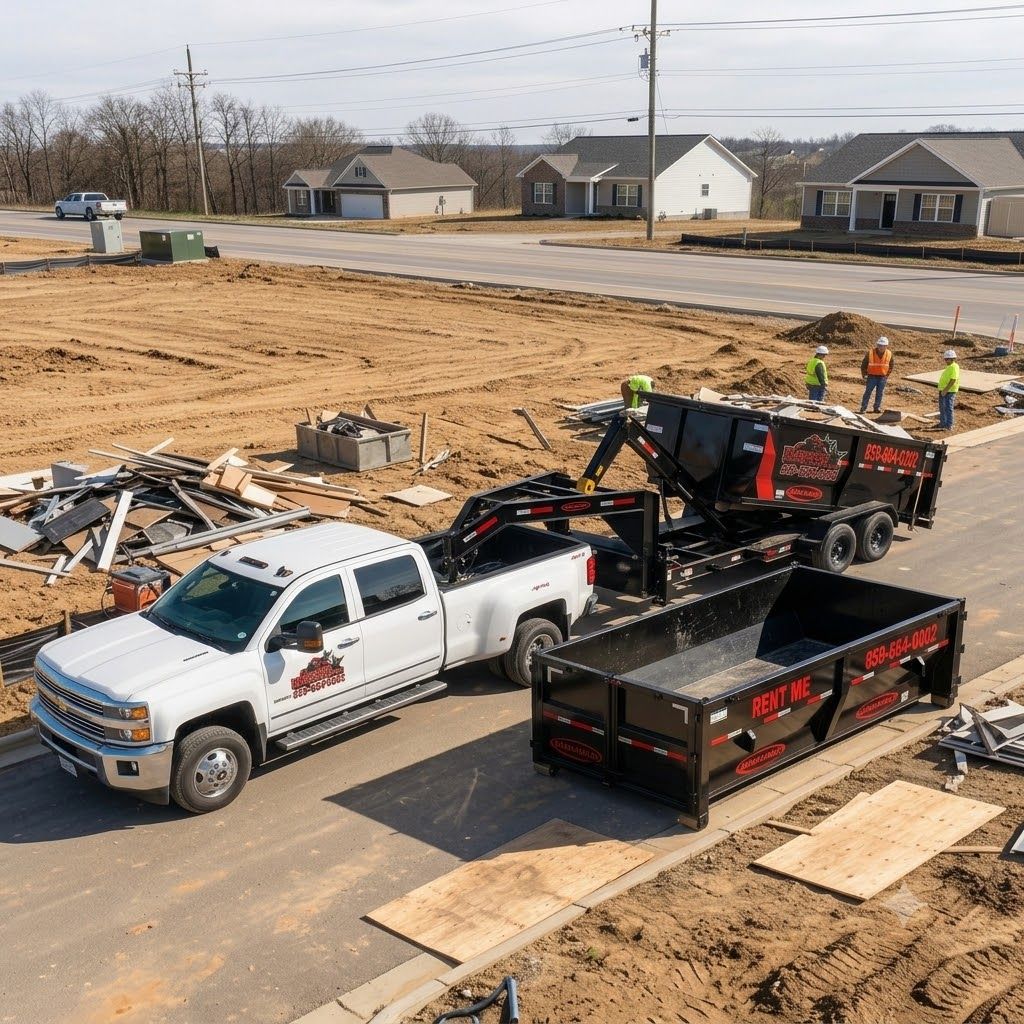 Dumpster swap-out in progress on a Lexington, KY job site during an extended rental period