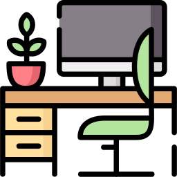 Desk with computer, chair, and plant. Light brown desk, gray monitor, green chair, pink plant.