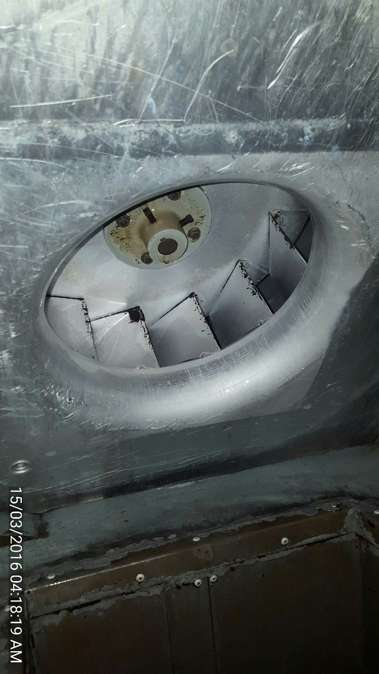 a close up of a fan with a hole in it .