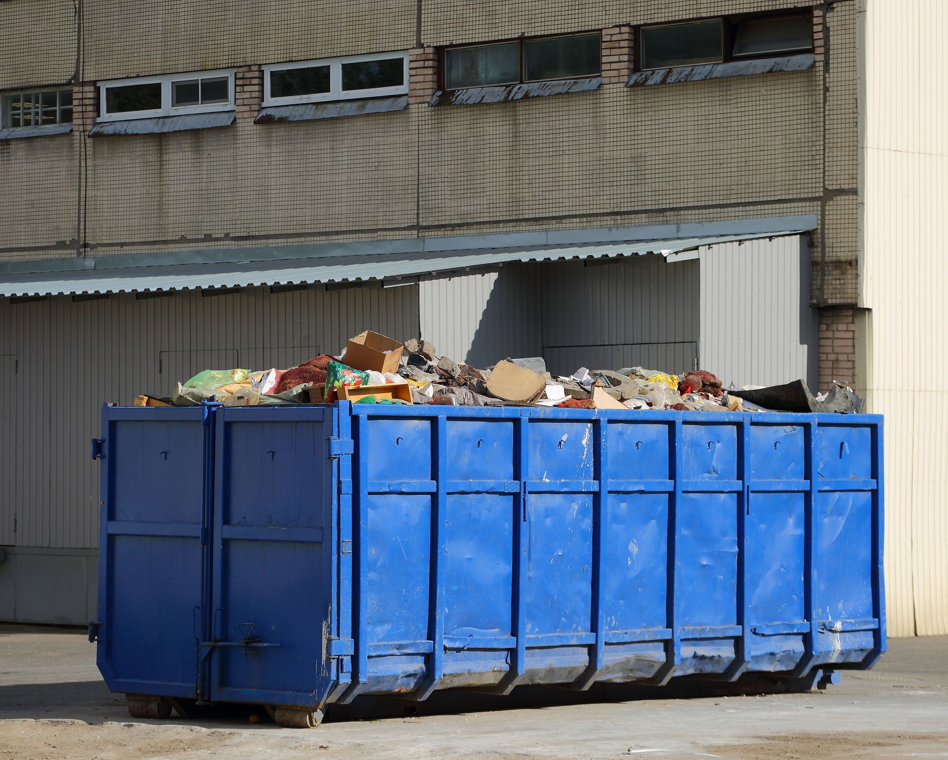 Large open-top dumpster rental container for heavy-duty waste management and disposal. Large open-top dumpster rental container for heavy-duty waste management and disposal.