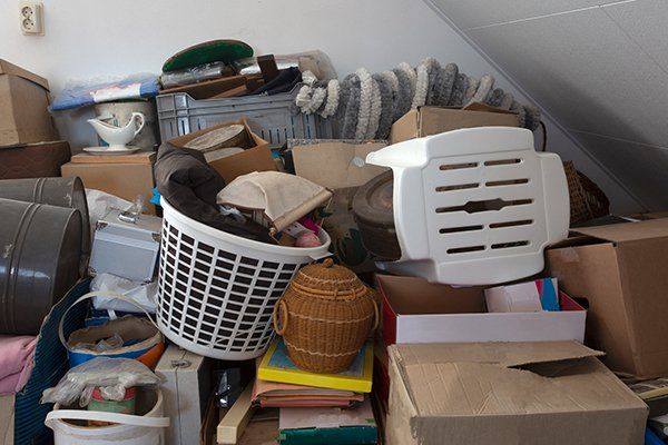 Pile of Junk in a House — Litchfield, MN — L & R Roll Off & Cleanup LLC Pile of Junk in a House — Litchfield, MN — L & R Roll Off & Cleanup LLC