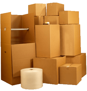 A stack of cardboard boxes and a roll of bubble wrap