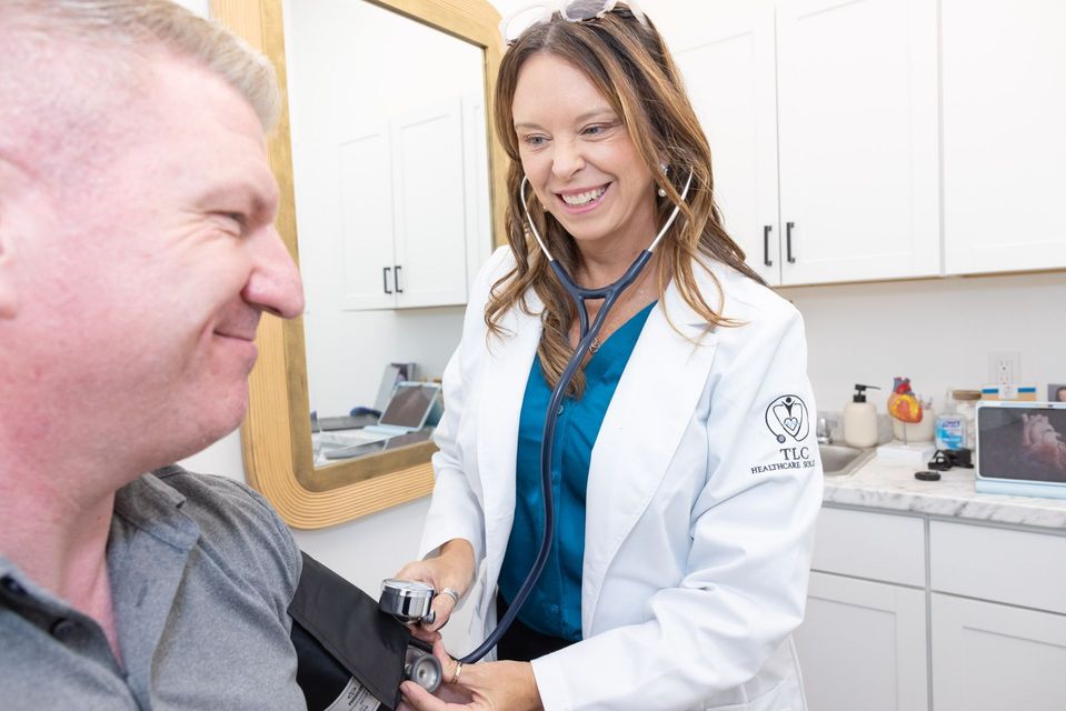 A doctor showing a mobile device to an older woman