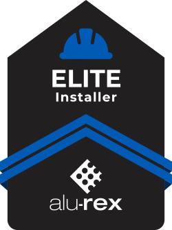 Elite Installer badge with blue hard hat icon and alu-rex logo on a black house-shaped background