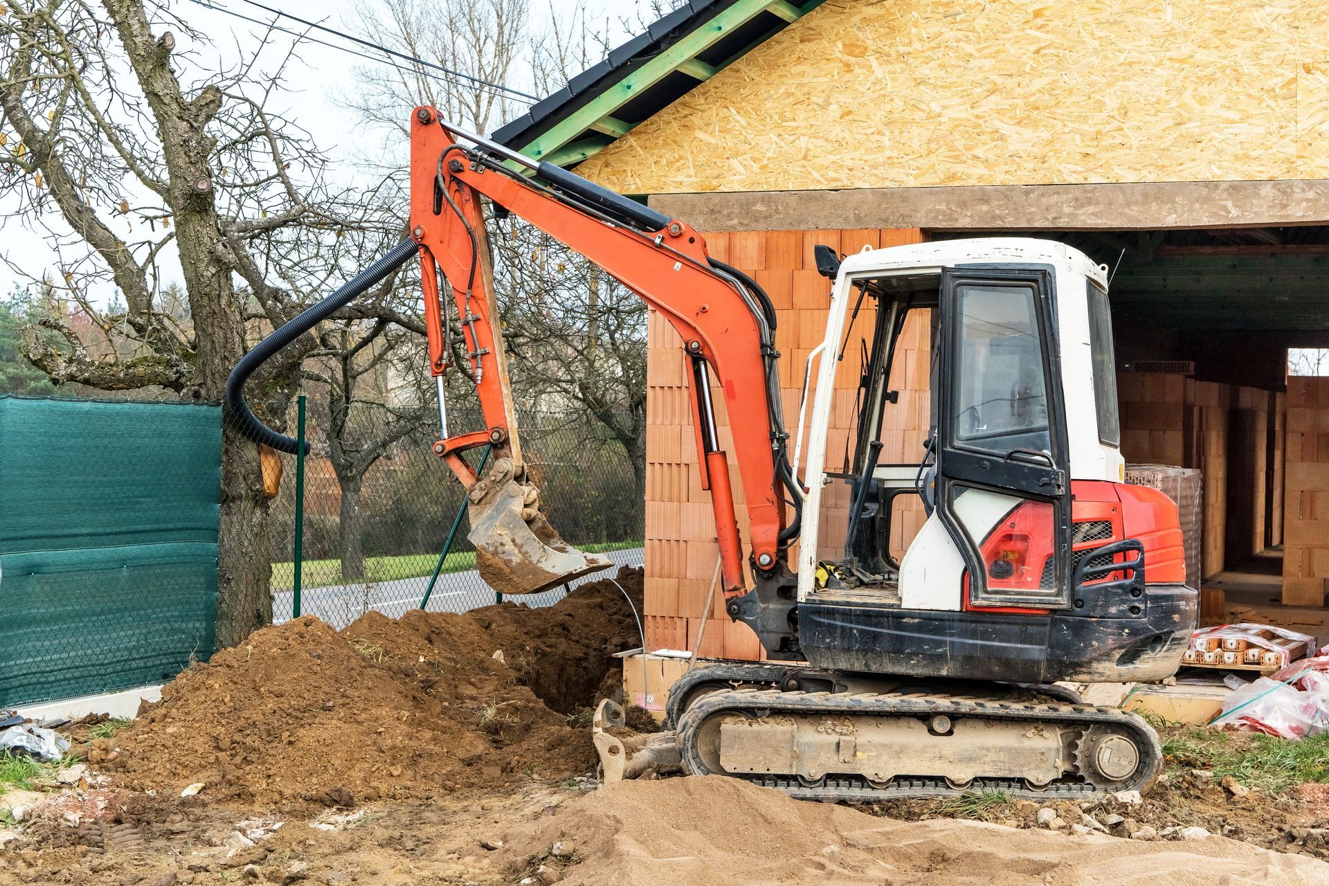 Construction site with a small excavator