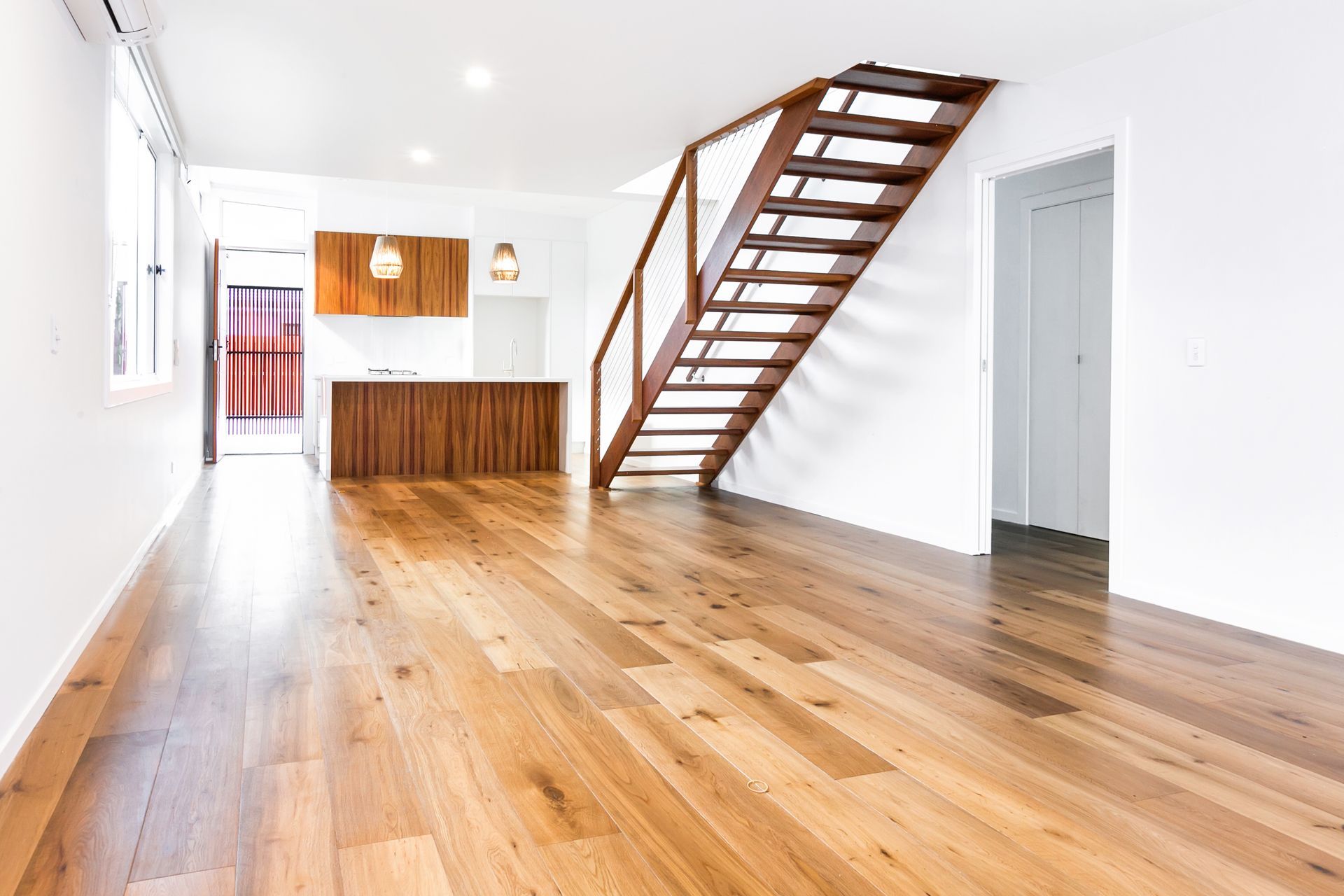 There is a staircase in the middle of the room.