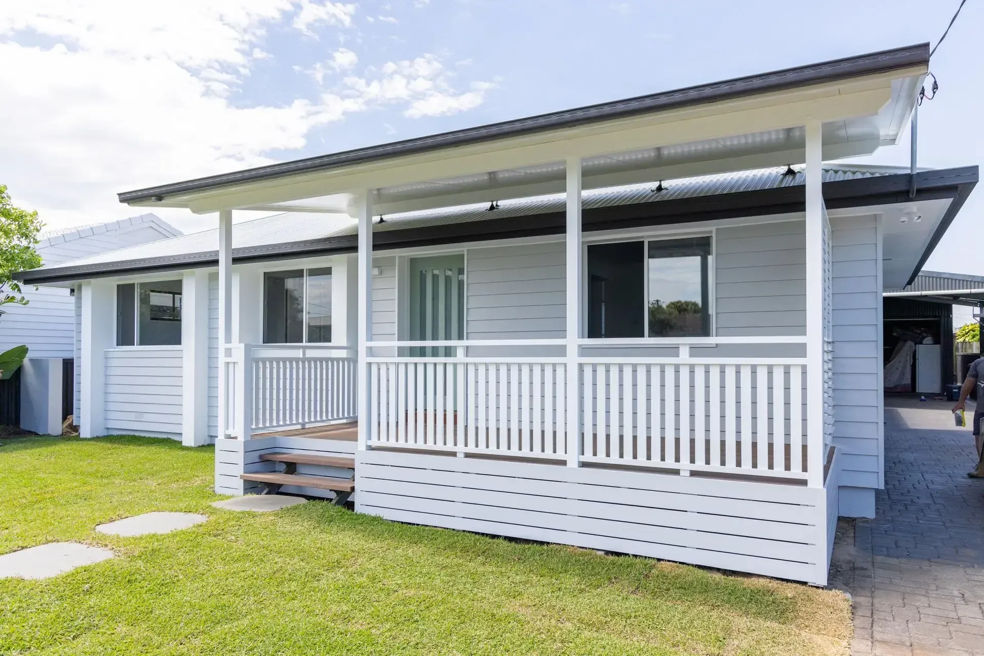 House extension in Tweed Heads — weatherboard façade with new veranda and balustrade.