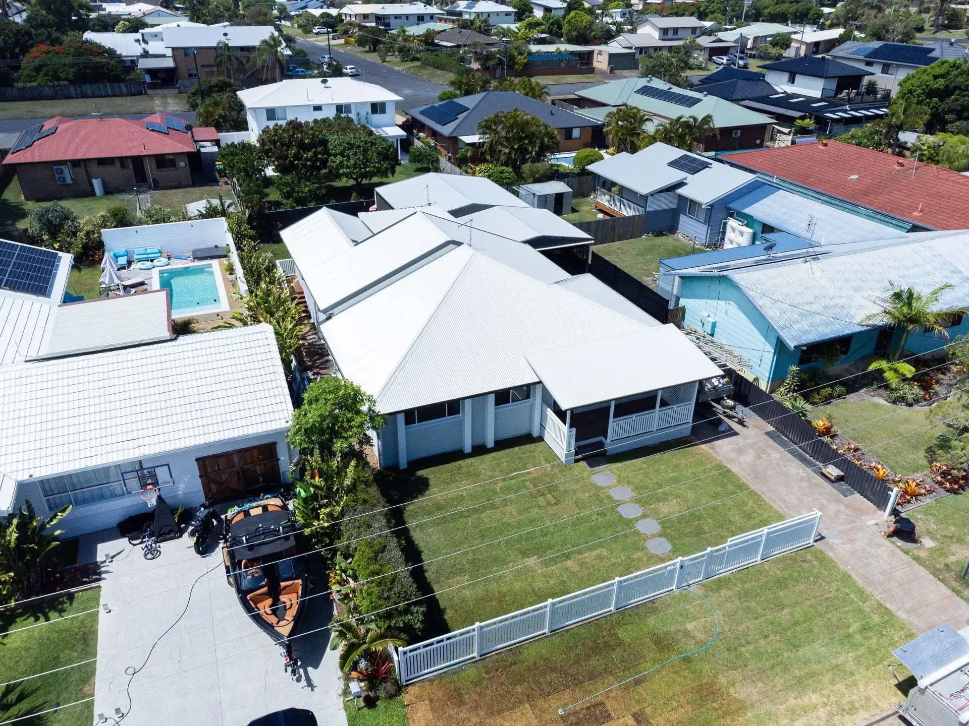 Roofing and insurance repairs in Tweed Heads — re-roofed coastal home with compliant drainage.