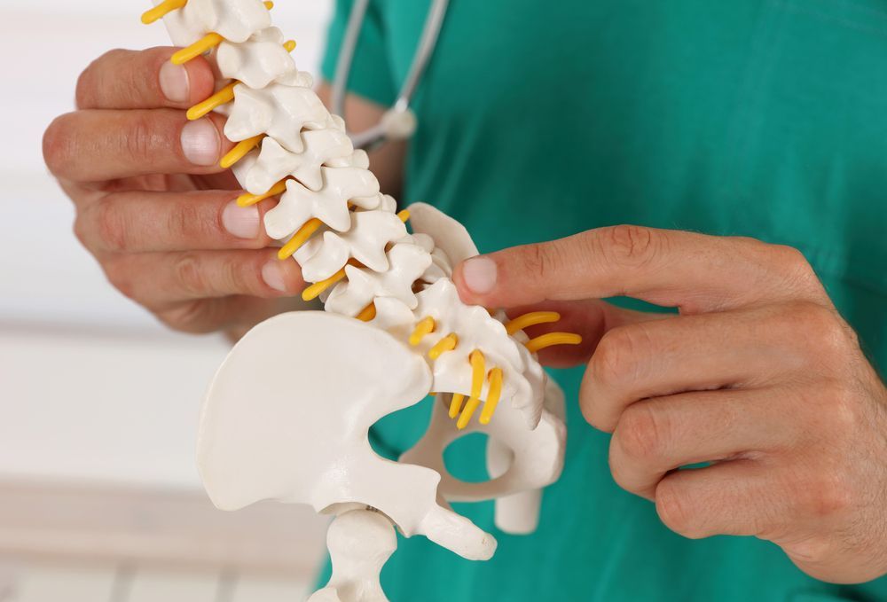 Doctor Explaining Spinal Decompression Mackay Treatment