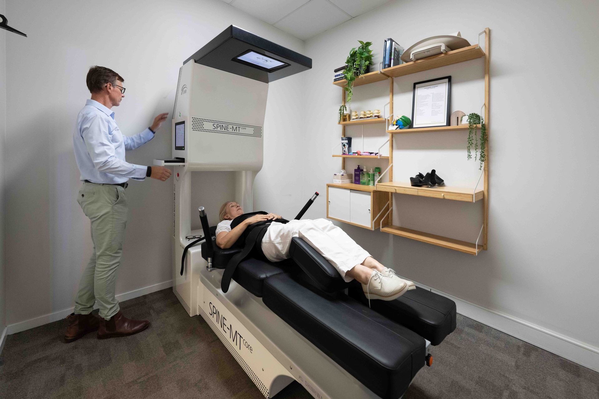 Patient Receiving Spinal Decompression Mackay Treatment