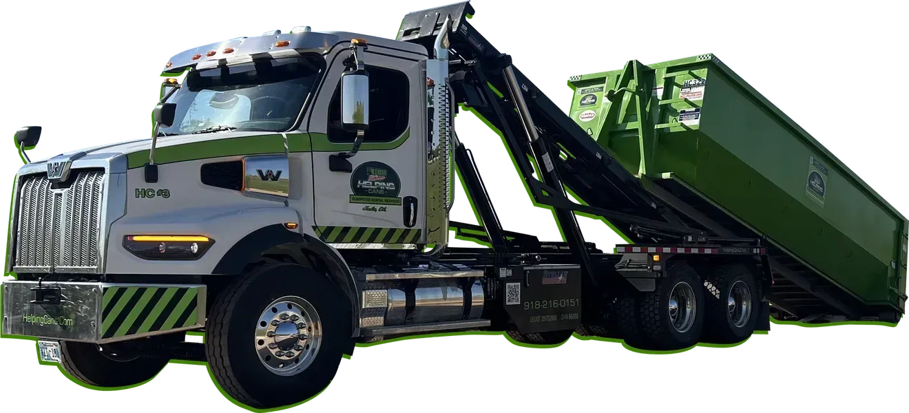 Helping Cans roll-off dumpster delivery truck in Jenks, OK