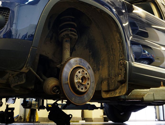 Close-up of stacked black tires with visible tread patterns
