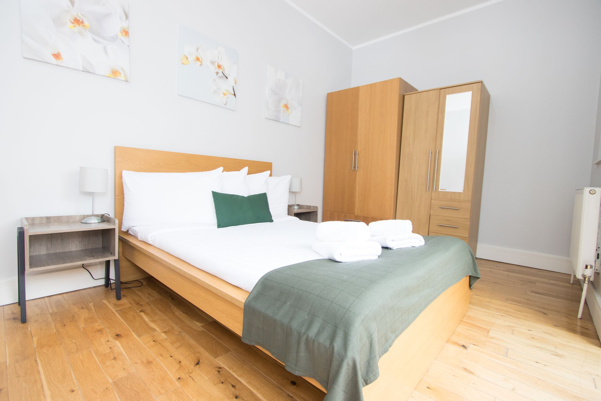 There is a large bed in the middle of the room.