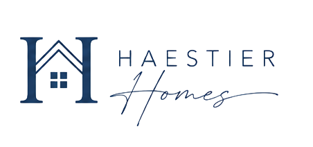 A blue and white logo for a real estate company.
