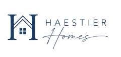 A blue and white logo for a real estate company.