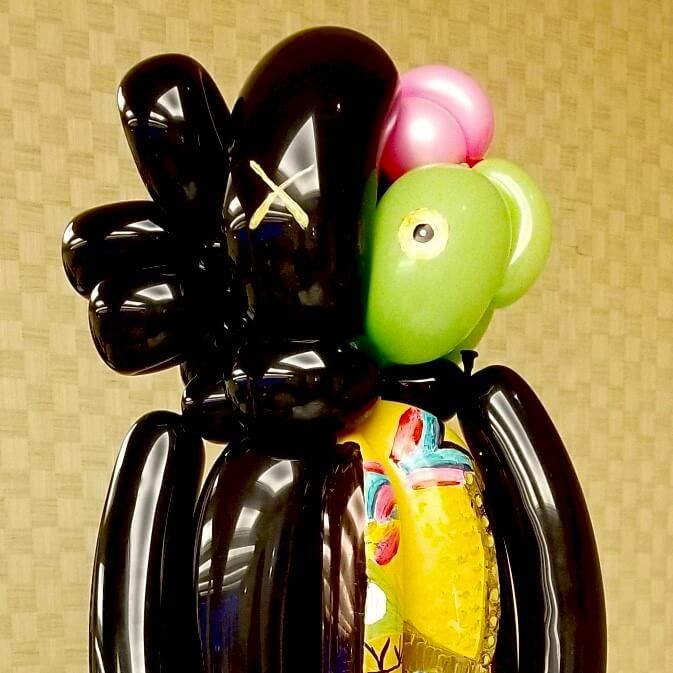 A bunch of balloons are stacked on top of each other