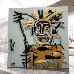 A painting by rm shows a man with a huge smile on his face
