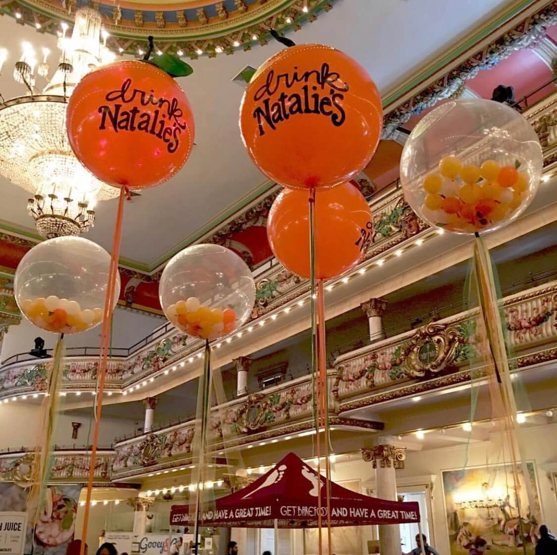 Balloons in an event space: orange 