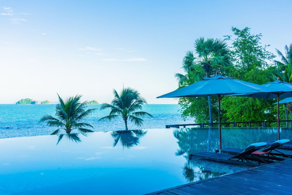 umbrella-chair-around-beautiful-luxury-outdoor-swimming-pool-with-sea-ocean-view-hotel-resort-holiday-vacation-travel (1) umbrella-chair-around-beautiful-luxury-outdoor-swimming-pool-with-sea-ocean-view-hotel-resort-holiday-vacation-travel (1)