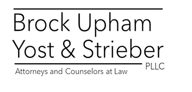 The logo for brock upham yost & strieber pllc attorneys and counselors at law