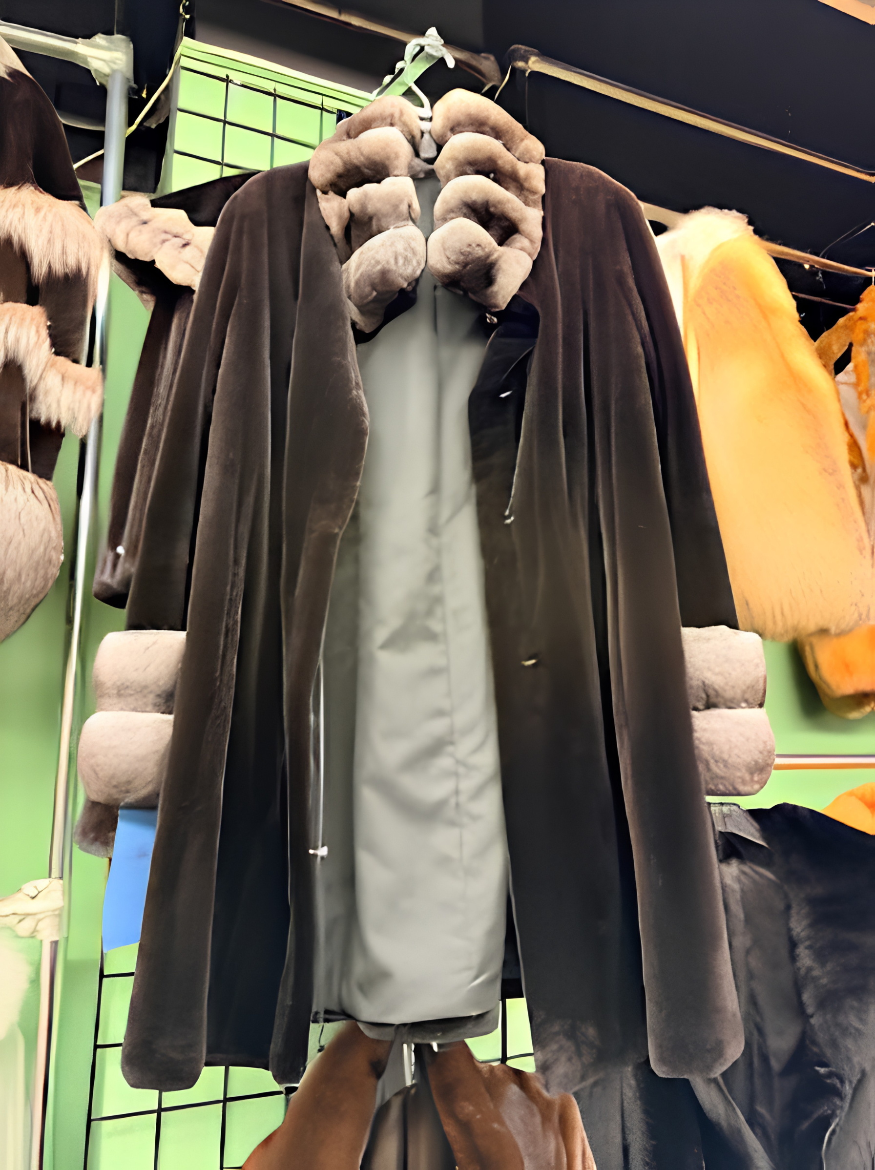 Elegant full-length brown coat with plush fur collar and cuffs by USA Furs by George Manhattan