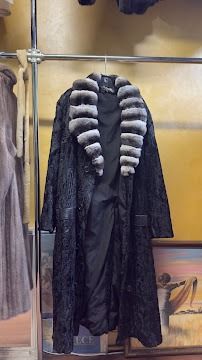 Custom designed black textured coat with striped chinchilla fur collar at USA Furs by George NYC