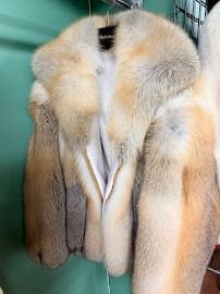 Custom handcrafted multi-color red fox fur jacket hanging at USA Furs by George New York