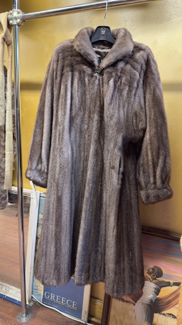 Elegant full-length taupe mink fur coat with decorative neck clasp at USA Furs by George Manhattan