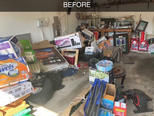 A garage filled with lots of junk and boxes.