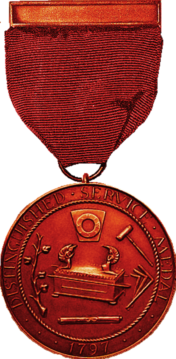 Red commemorative medal with a ribbon, showing a Arch of the Covenant.