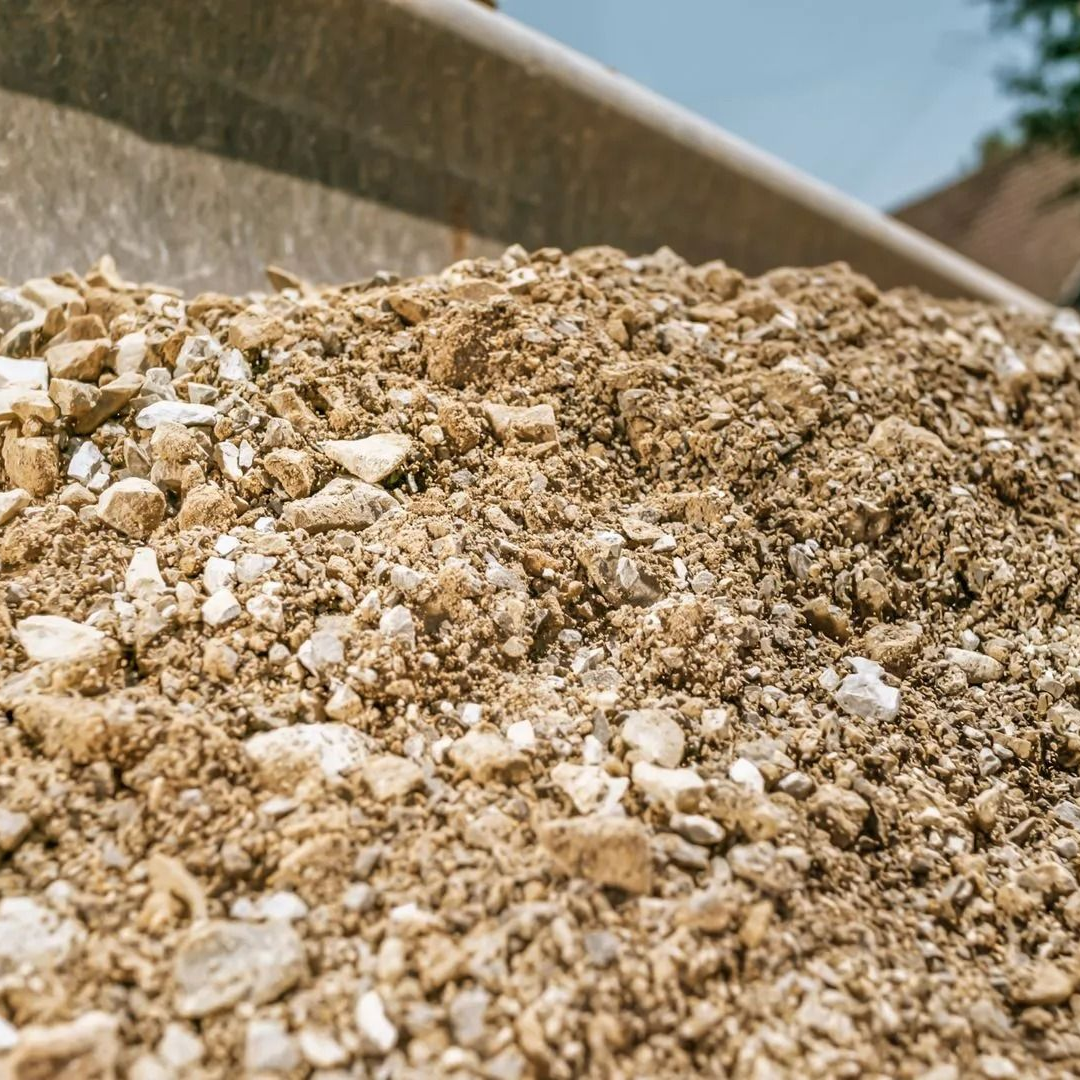 A pile of cream-colored rocks, under the sun. A pile of cream-colored rocks, under the sun.