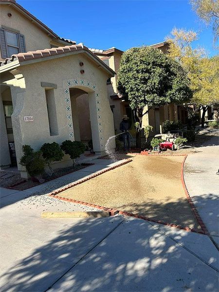 A house with a lot of dirt in front of it