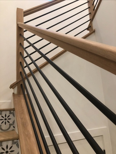 Black Horizontal Rods With Red Oak Square Newel Posts and Hand Railin