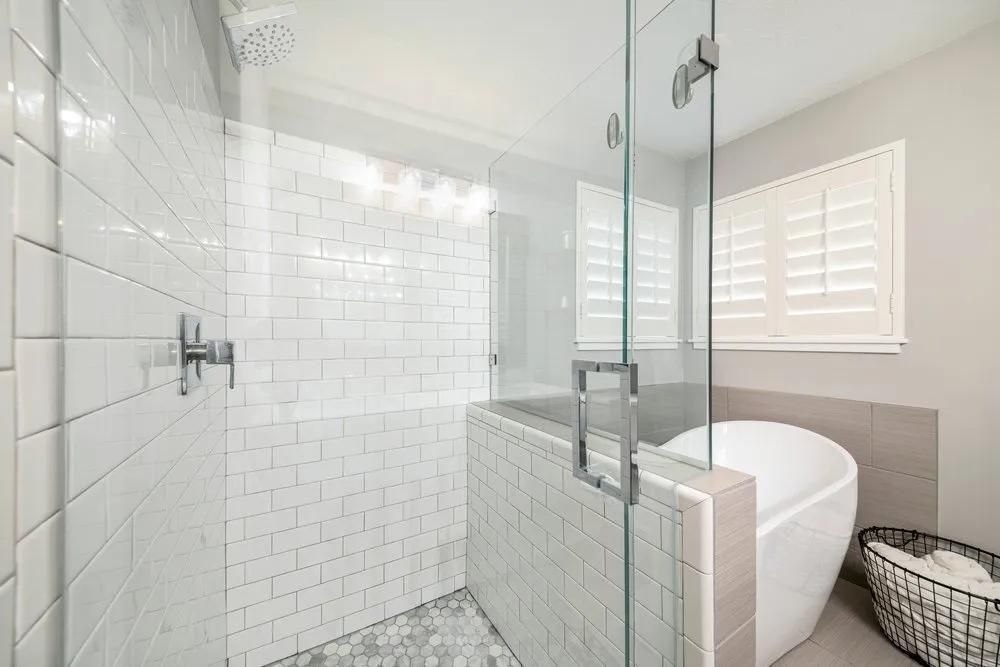 A Bathroom with A Walk in Shower and A Bathtub — City Glass Newcastle in Jewells, NSW